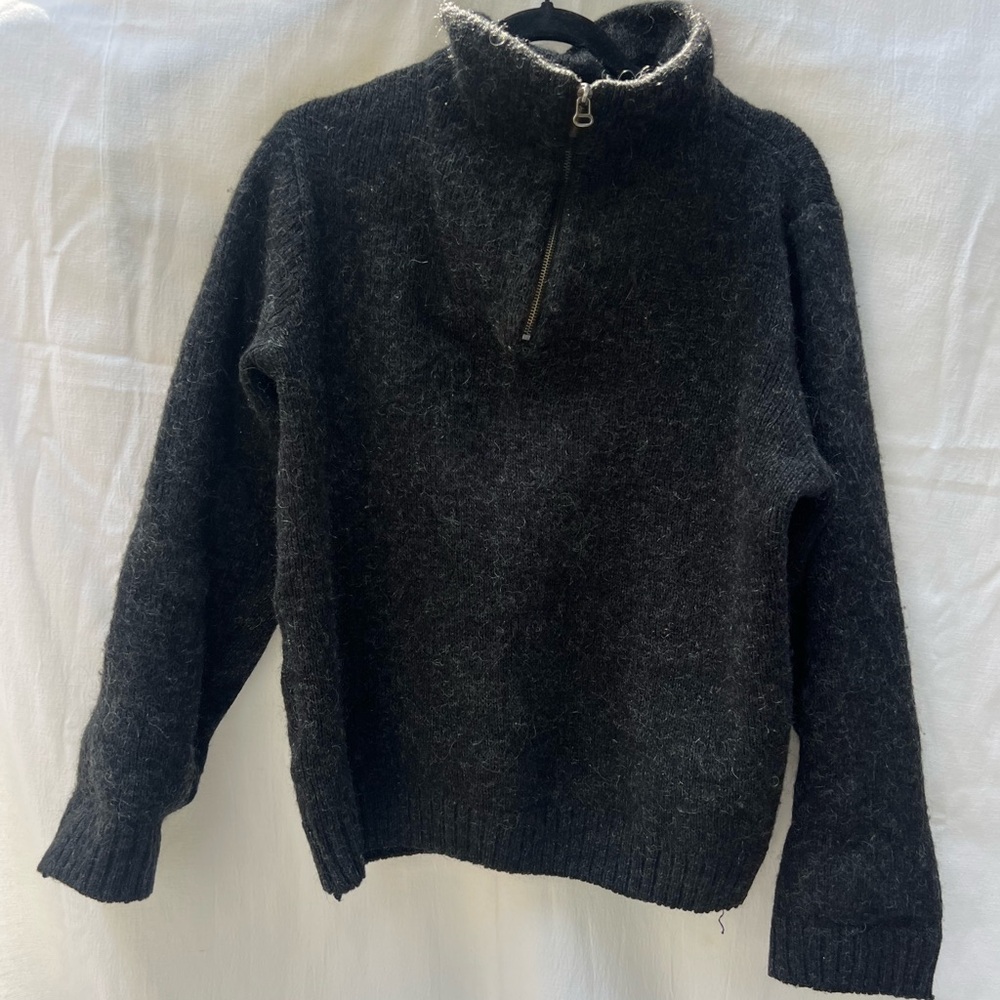 Classic Black V-Neck Sweater with Ribbed Cuffs